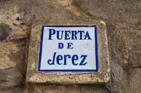 Tarifa, Spain: sign of Jerez Gate, the only entrance through the old Moorish city walls remaining of the 4 original ones, which gave access to the road northwards to Jerez de la Frontera