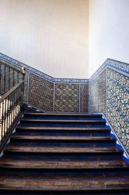 Spain: details of the decorated staircase of Admiral's Hall, the House of Trade with the Indies founded in 1504 by Queen Isabel I after the discovery of America, in the Alcazar of Seville clipart