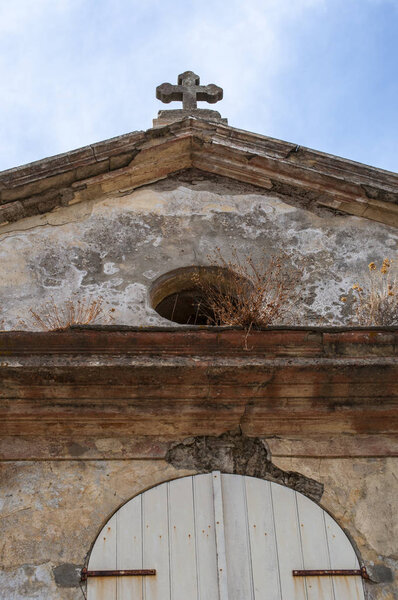 Corsica: details of the Chapelle Sainte Lucie, Saint Lucia Chapel, a little catholic church in the heart of the Cap Corse, the northern peninsula of the French island famous for wild views