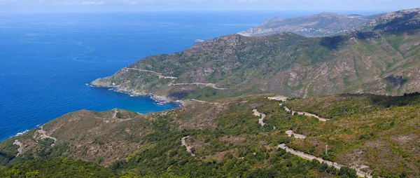 Corsica: the Mediterranean Sea, the Mediterranean maquis and the winding roads of the western side of Cap Corse, the northern peninsula of the French island famous for its wild landscape