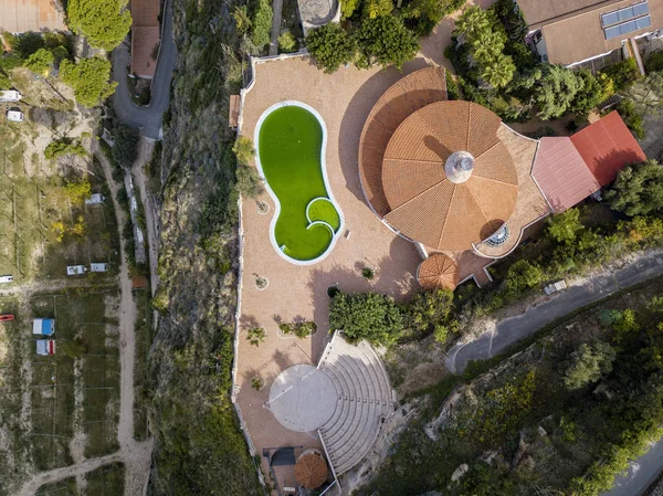 Aerial view of the Calabrian coast, villas and resorts on the cliff. Transparent sea and wild coast. Locality of Riaci near Tropea, Calabria. Italy