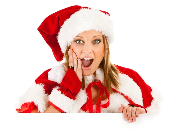 Natale: Santa ragazza guardando oltre la carta bianca — Foto Stock