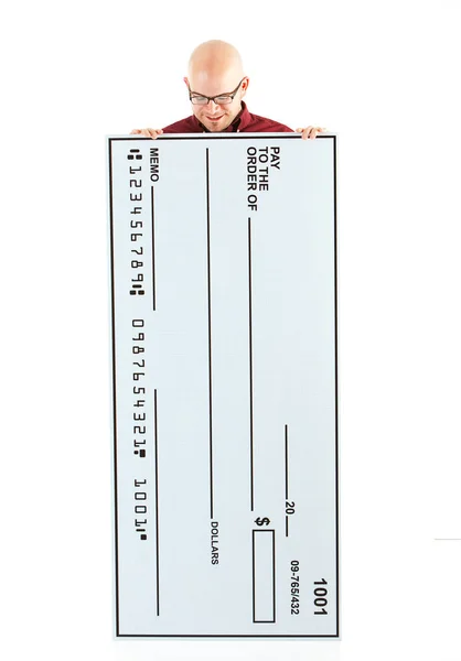 Comprobar: Hombre mirando hacia abajo en cheque en blanco — Foto de Stock