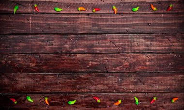 Background: Chile Pepper Decorations on Mexican Tabletop clipart