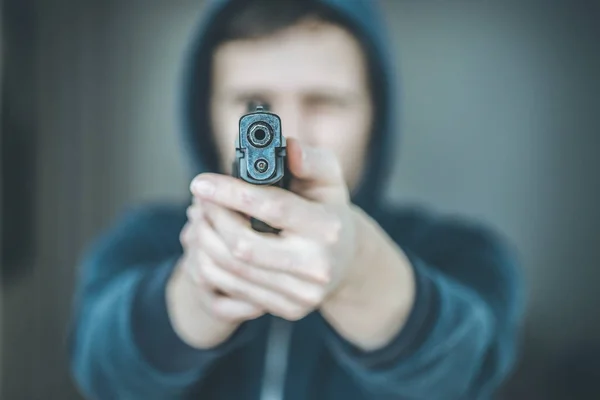 Robber Criminal Aiming Black Gun Blurry Face — ストック写真