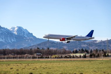 Aircraft is touching down on the airport, close up 