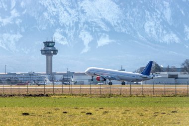 Aircraft is touching down on the airport, close up 
