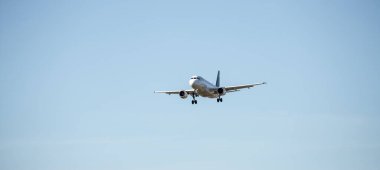 Aircraft is touching down on the airport, close up