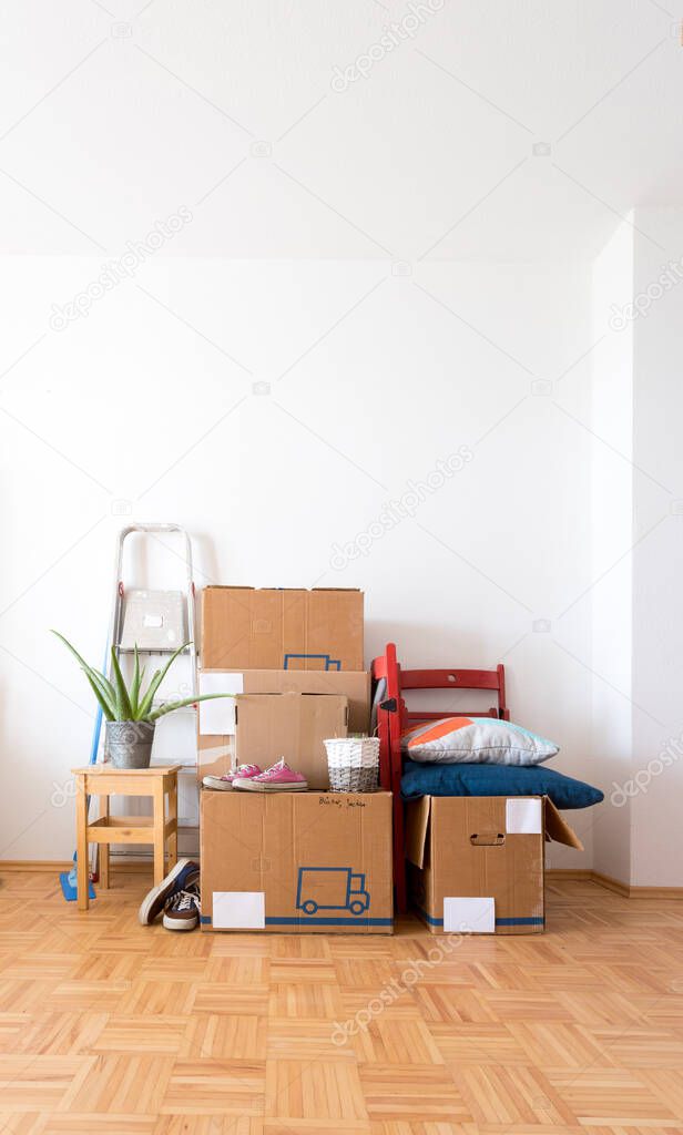 Move. Cardboard boxes, cleaning stuff and things for moving into a new home  