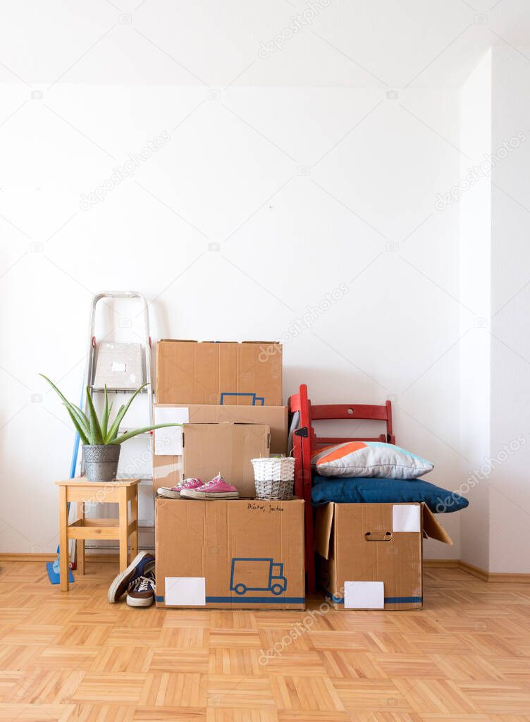 Move. Cardboard boxes, cleaning stuff and things for moving into a new home  