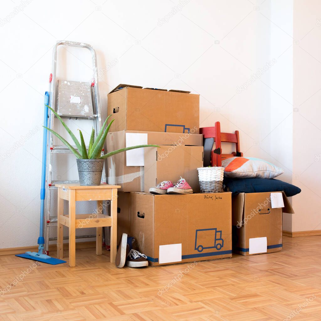 Move. Cardboard boxes, cleaning stuff and things for moving into a new home  