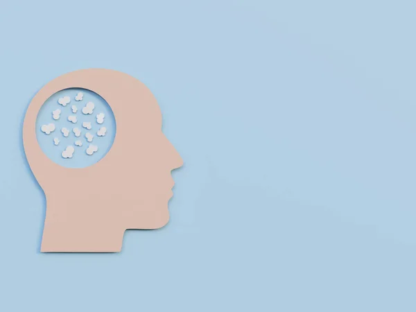 Men Head with popcorn or small clouds as symbols of poor thoughts Minimalism Cut Paper Art over a light blue background
