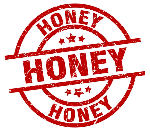 Timbre grunge rouge rond miel — Image vectorielle