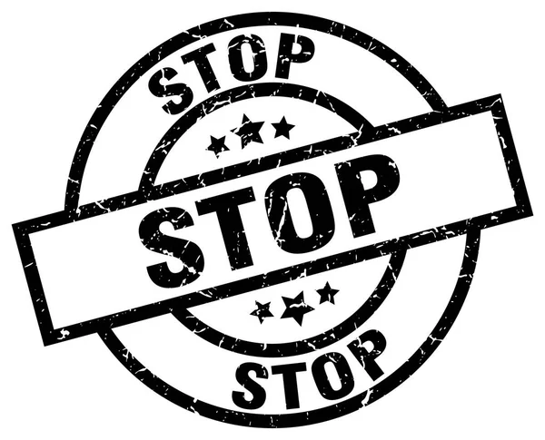 Stop rotondo grunge timbro nero — Vettoriale Stock