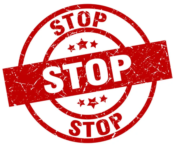 Stop tondo rosso grunge timbro — Vettoriale Stock
