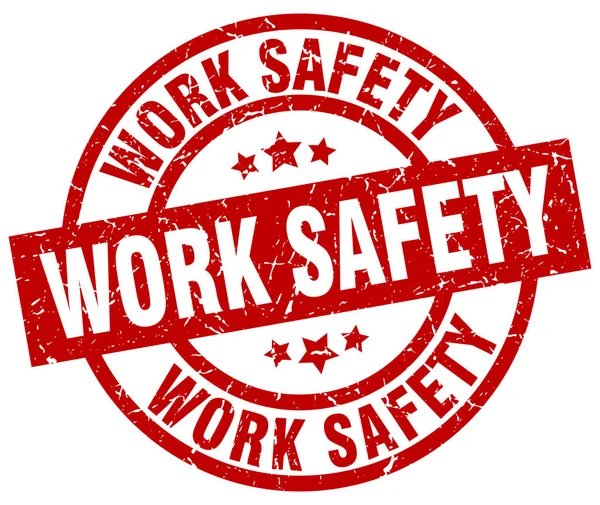 Work safety round red grunge stamp — Stock Vector