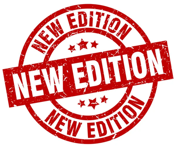Nuova edizione rotonda grunge timbro rosso — Vettoriale Stock