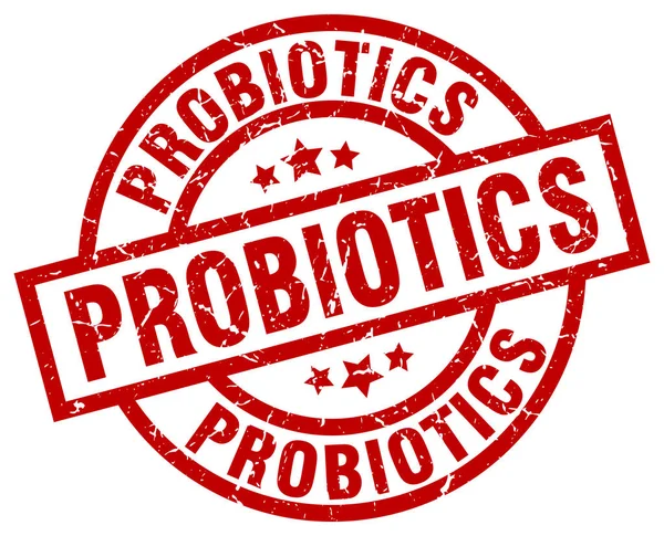 Probiotika rund um den roten Grunge-Stempel — Stockvektor