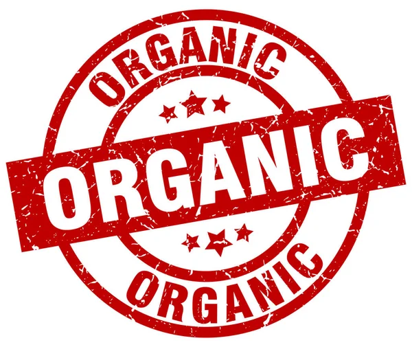 Organic round red grunge stamp — Stock Vector