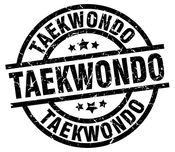 Taekwondo redondo grunge carimbo preto —  Vetores de Stock