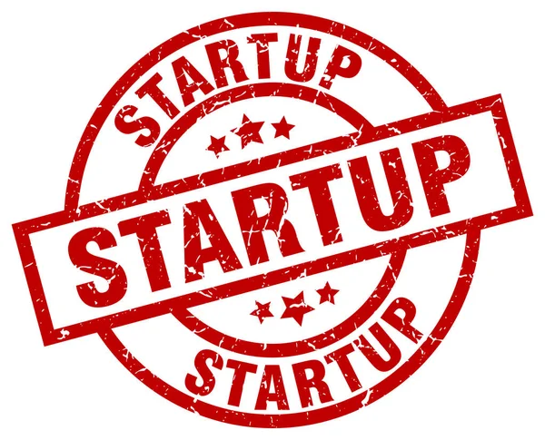 Startup round red grunge stamp — Stock Vector