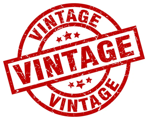 Vintage rotondo rosso grunge timbro — Vettoriale Stock