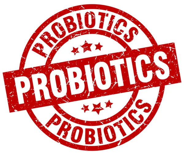 Probiotika rund um den roten Grunge-Stempel — Stockvektor