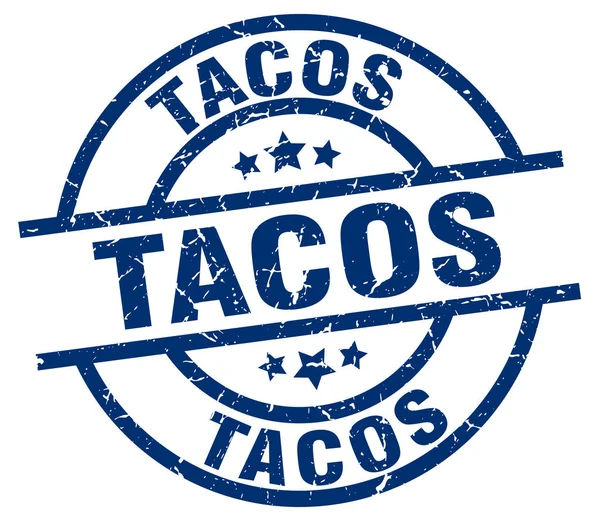 Taco mavi yuvarlak grunge damgası — Stok Vektör