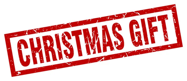 Grunge cuadrado rojo sello de regalo de Navidad — Vector de stock