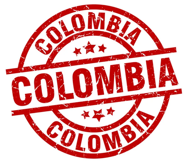 Colômbia vermelho redondo grunge selo —  Vetores de Stock