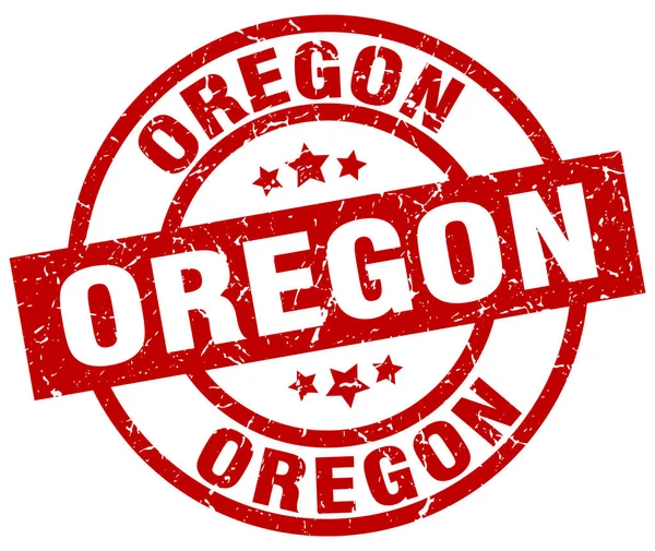 Oregon timbre grunge rond rouge — Image vectorielle