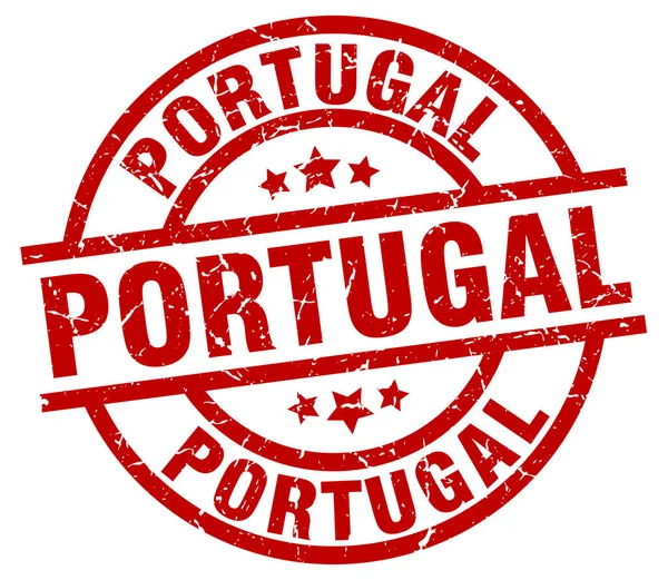 Красная круглая гранжевая марка Португалии — стоковый вектор
