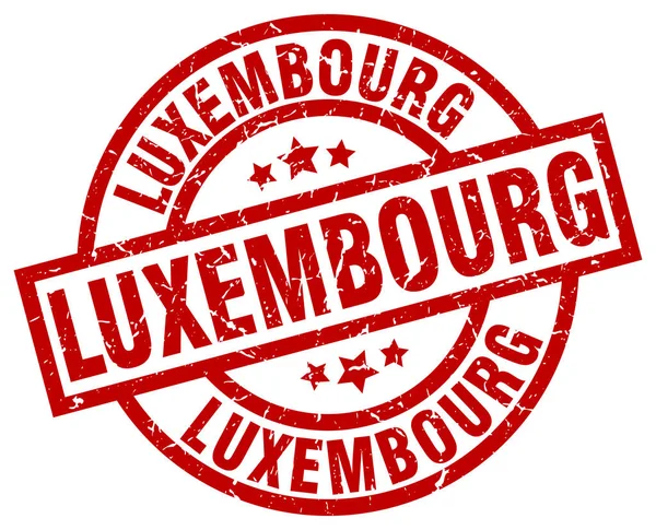 Luxembourg red round grunge stamp — Stock Vector