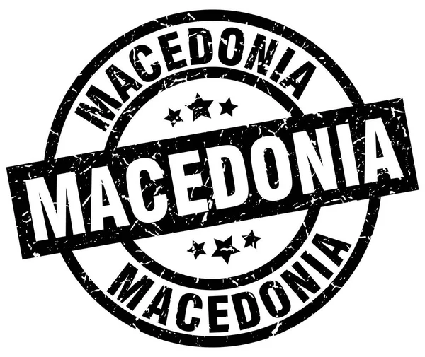 Macedonia black round grunge stamp — Stock Vector