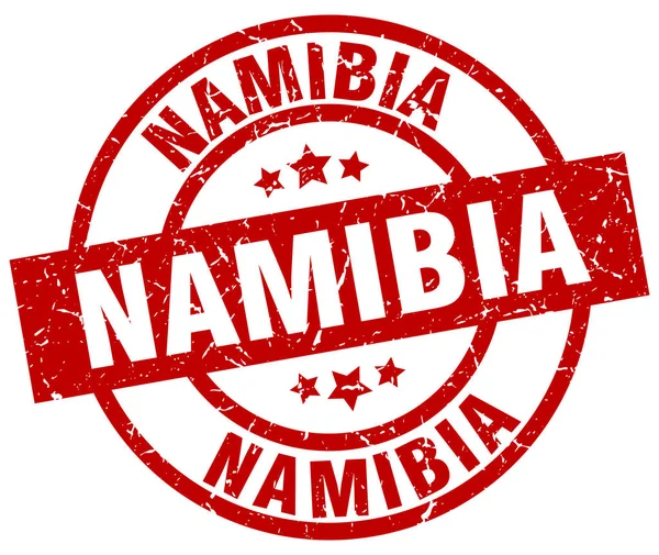 Namibya kırmızı yuvarlak grunge damgası — Stok Vektör