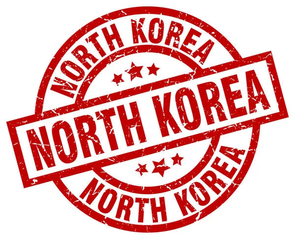 North Korea red round grunge stamp — Stock Vector