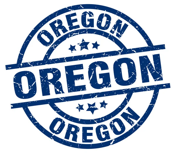Tampon grunge rond bleu Oregon — Image vectorielle