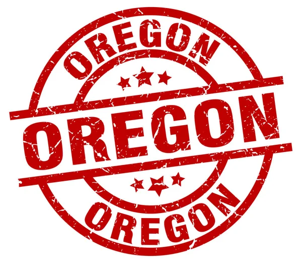 Oregon timbre grunge rond rouge — Image vectorielle