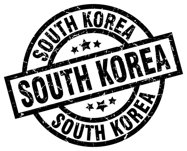 Südkoreas schwarze runde Grunge-Briefmarke — Stockvektor