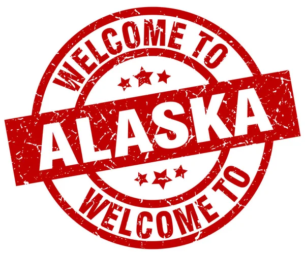 Benvenuto in Alaska timbro rosso — Vettoriale Stock