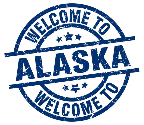 Benvenuto in Alaska timbro blu — Vettoriale Stock
