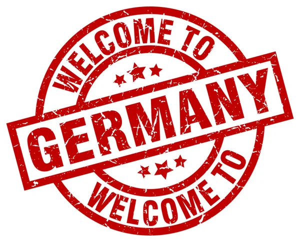 Benvenuto in Germania timbro rosso — Vettoriale Stock