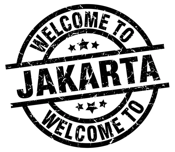 Willkommen in Jakarta schwarze Briefmarke — Stockvektor