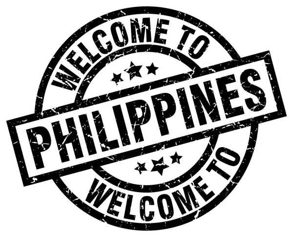 Benvenuto a Filippine timbro nero — Vettoriale Stock