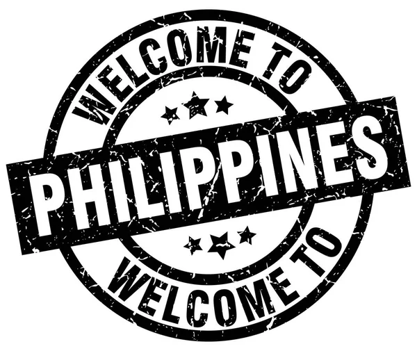 Benvenuto a Filippine timbro nero — Vettoriale Stock