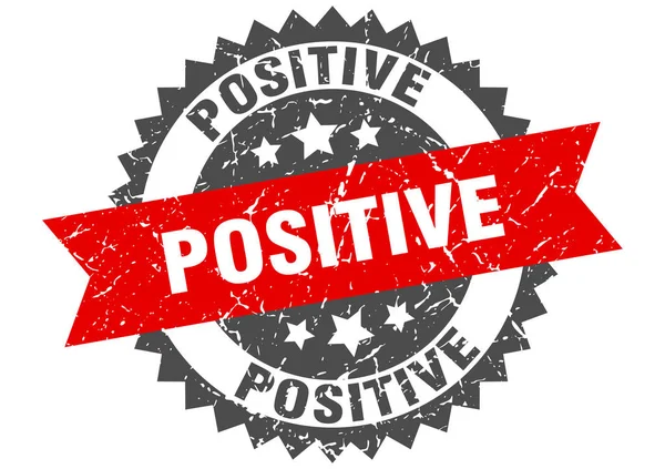 Positivt grunge stempel med rødt bånd. positiv – Stock-vektor