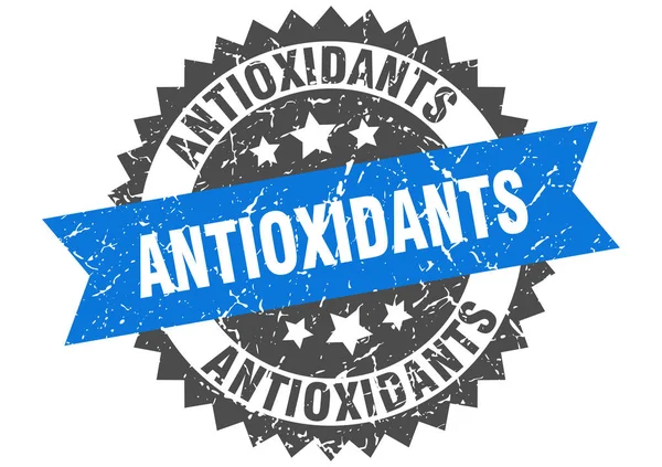 Antioxidantes grunge selo com faixa azul. antioxidantes — Vetor de Stock