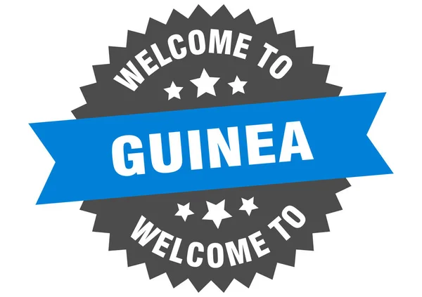 Firma Guinea. Benvenuti a Guinea adesivo blu — Vettoriale Stock