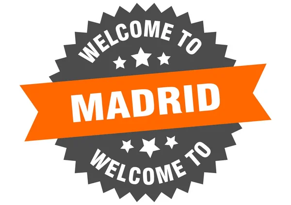Madridskylten. Välkommen till Madrid orange klistermärke — Stock vektor