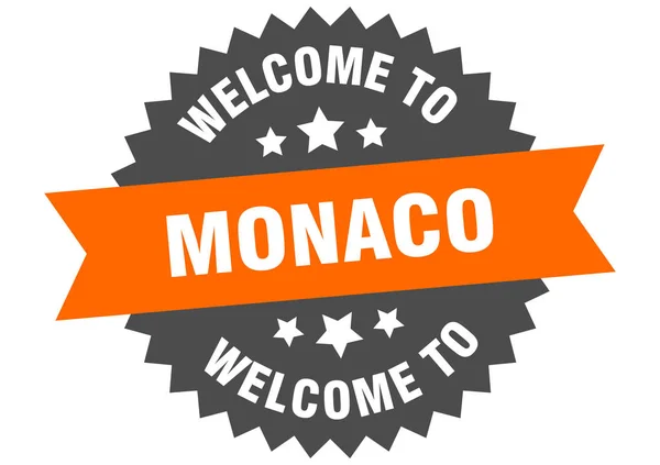 Signo de Mónaco. Bienvenido a Mónaco etiqueta naranja — Vector de stock